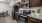 a kitchen with black appliances