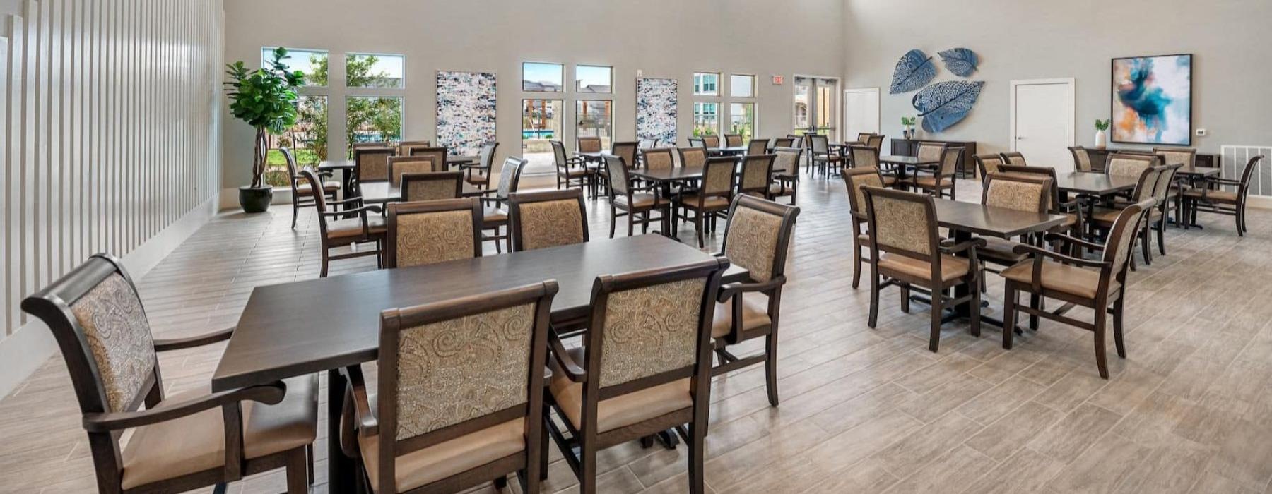 bright dining hall with tables and chairs