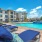 lounge chairs next to pool
